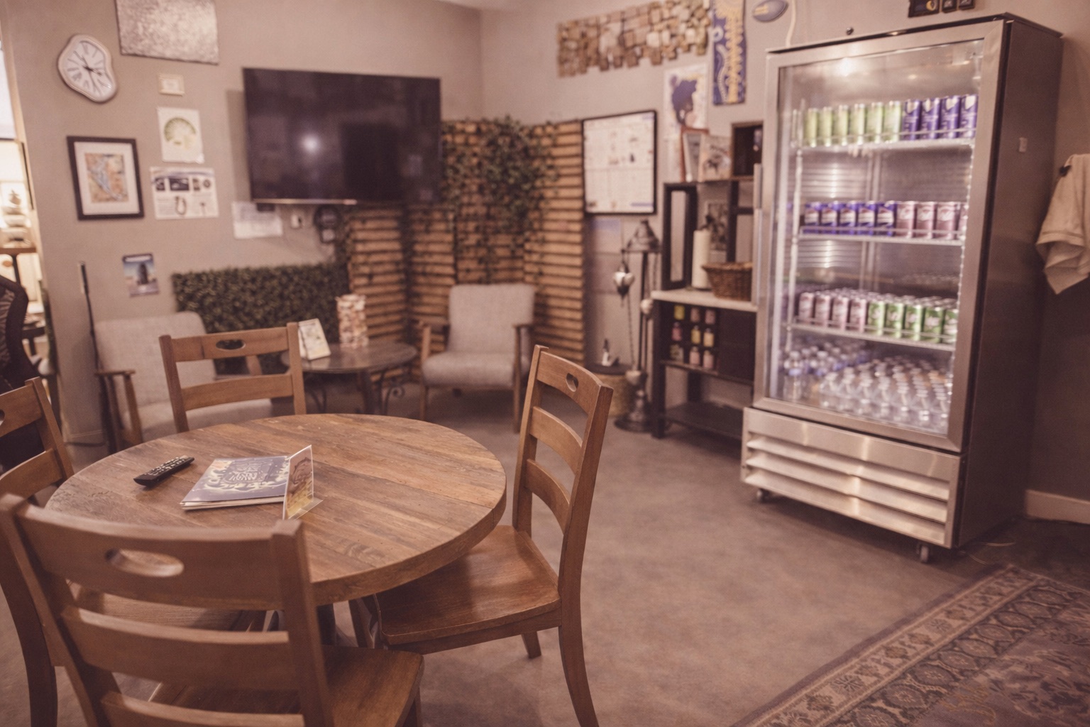 Table and gathering area in the AlmaDose Denver space.